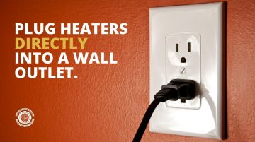 Plug heaters into wall outlet image